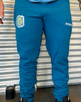 Pantalón Largo Chupín Frisa Niño/ Niña Escudo