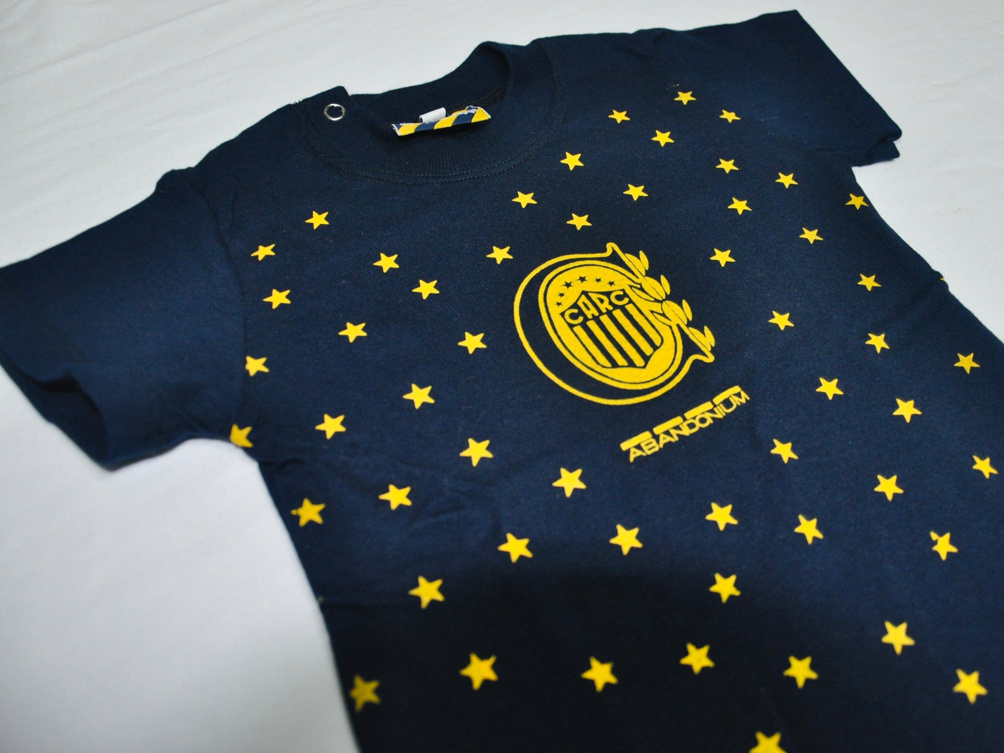 Remera MC Bebé Escudo y Estrellas