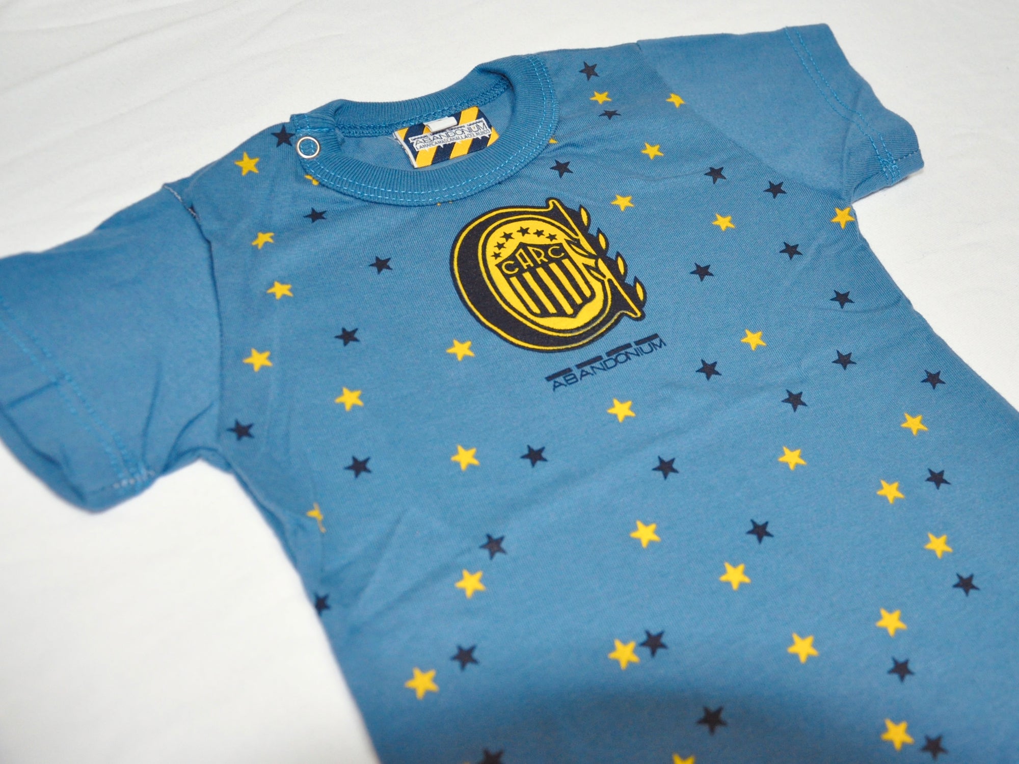 Remera MC Bebé Escudo y Estrellas